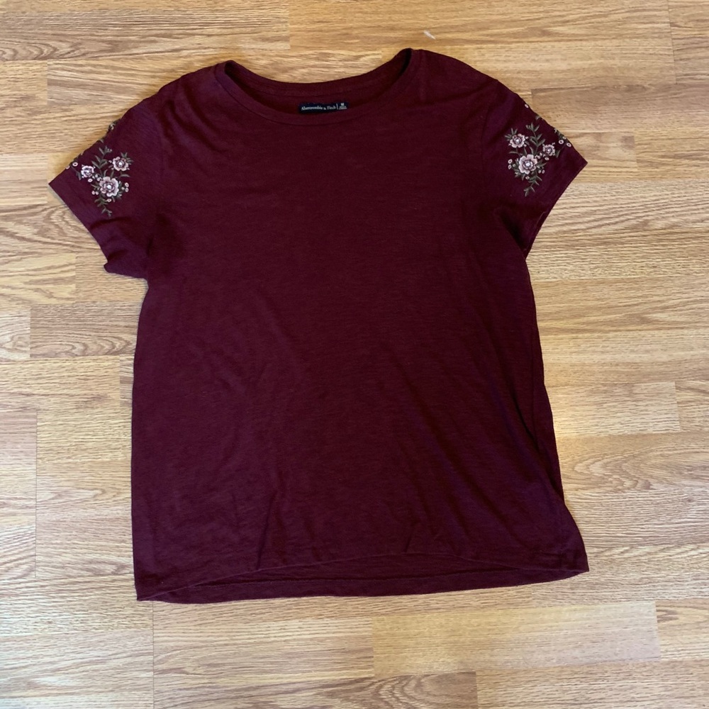 T shirt with embroidered detailing on sleeves